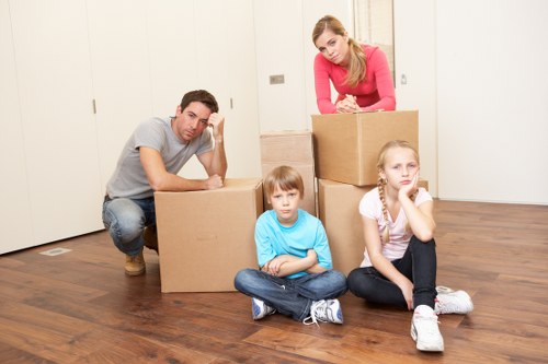 Packed boxes and careful furniture handling during a local move